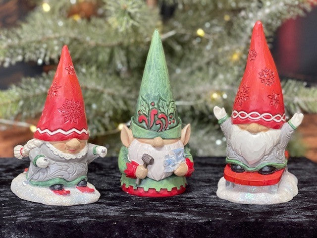 JIM SHORE HEARTWOOD CREEK GNOME WITH BRAIDS SLEDDING 6010844