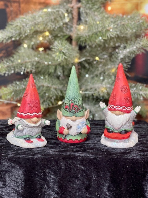 JIM SHORE HEARTWOOD CREEK GNOME WITH BRAIDS SLEDDING 6010844