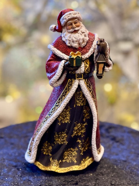 JOSEPH'S STUDIO SANTA WITH LAMP & PRESENT 633499