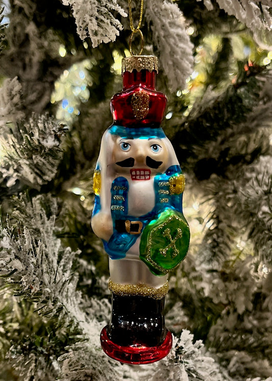 GLASS NUTCRACKER WITH BLUE COAT ORNAMENTS 4523173