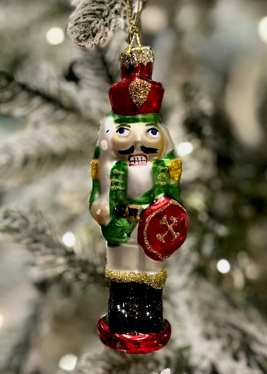 GLASS NUTCRACKER WITH GREEN COAT ORNAMENT 4523173
