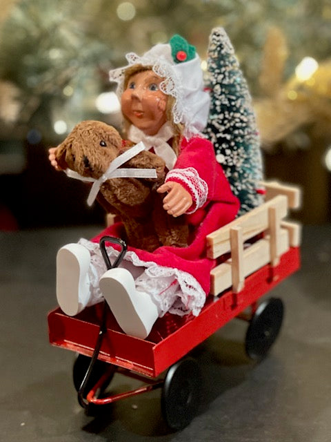 BYERS' CHOICE TODDLER GIRL IN WAGON1821B