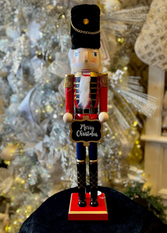 NUTCRACKER WITH MERRY CHRISTMAS SIGN TALL XX7874