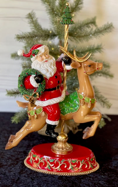 CAROUSEL DEER WITH SANTA MT063