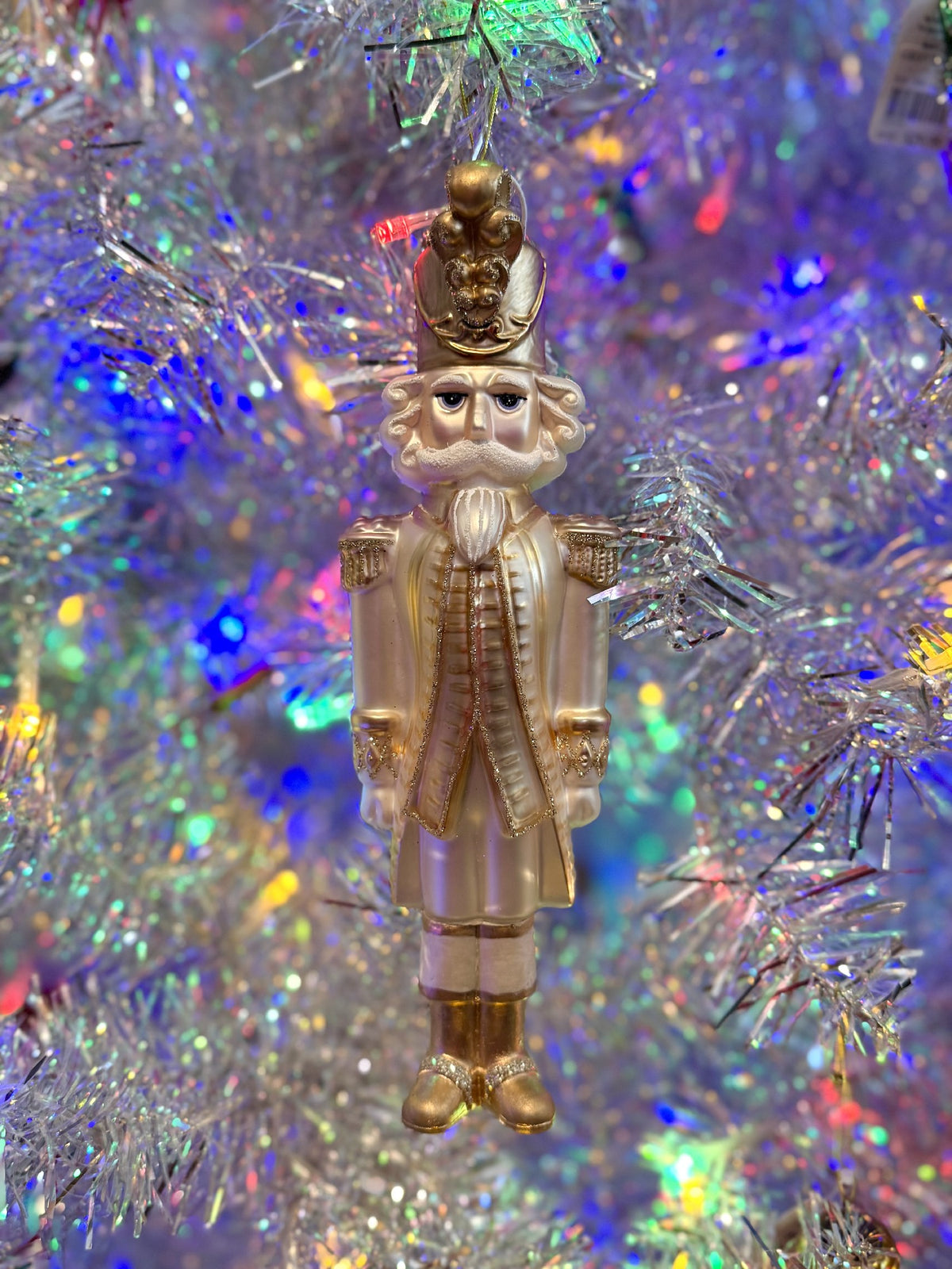 IVORY AND CHAMPAGNE GLASS NUTCRACKER ORNAMENT FCA146