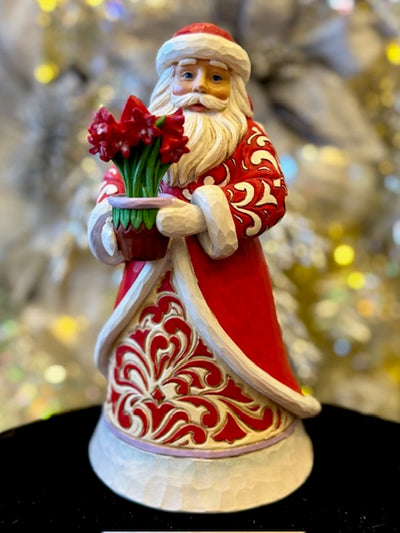JIM SHORE SANTA WITH BLOOMING AMARYLLIS 6017005