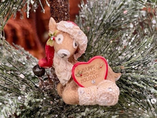 TAILS FROM THE HEART REINDEER WITH SANTA HAT