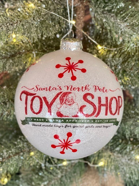 NORTH POLE TOY SHOP ROUND GLASS ORNAMENT 4124529