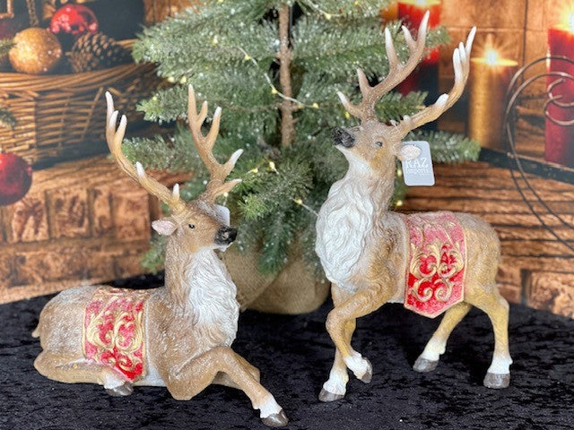 PAIR OF REINDEER WITH RED/GOLD SADDLE BLANKETS 4111114
