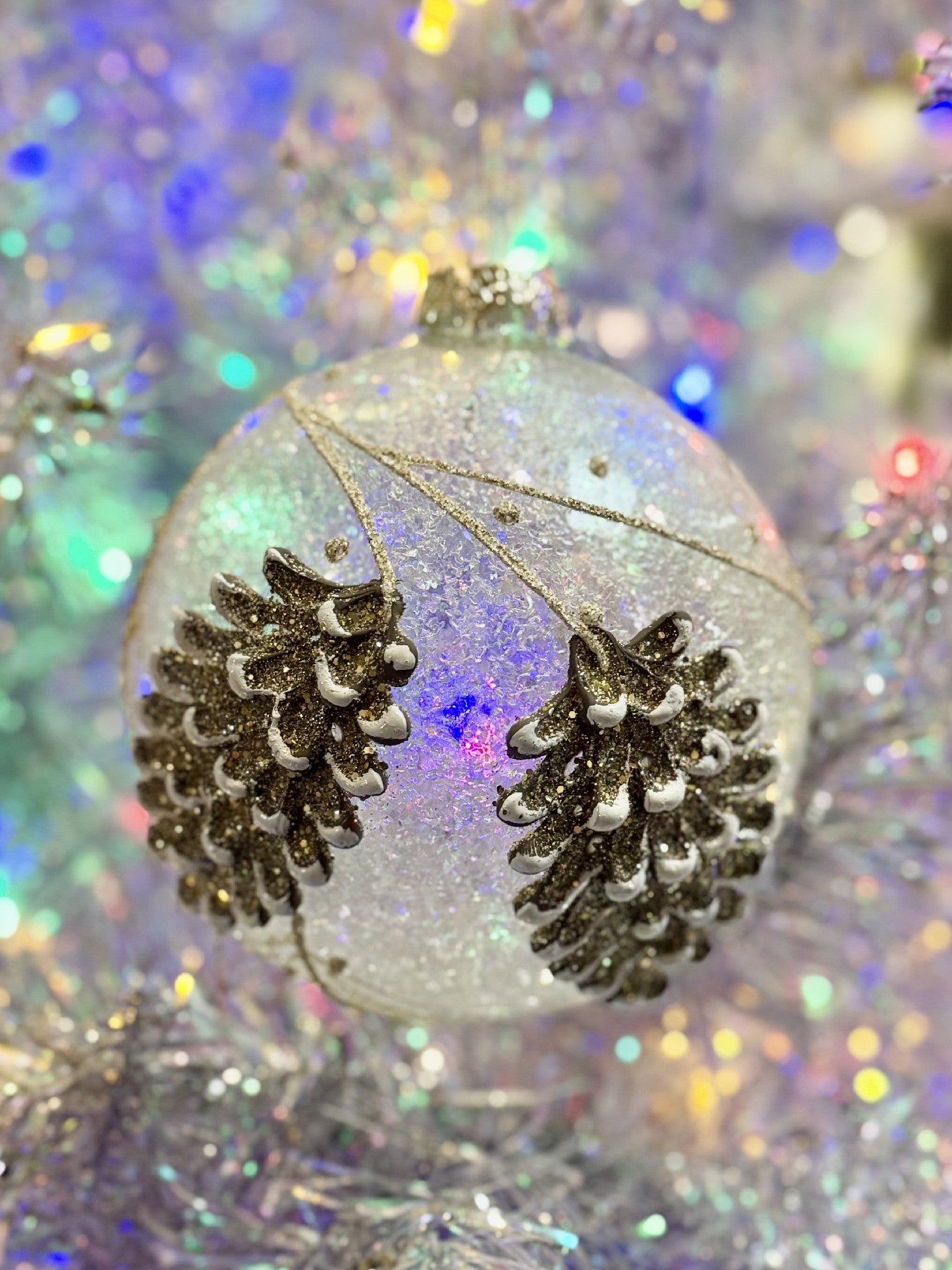 FROSTED GLASS ROUND ORNAMENT WITH PINECONES
