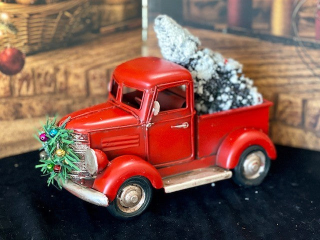 RED OLD STYLE PICK UP TRUCK WITH TREE