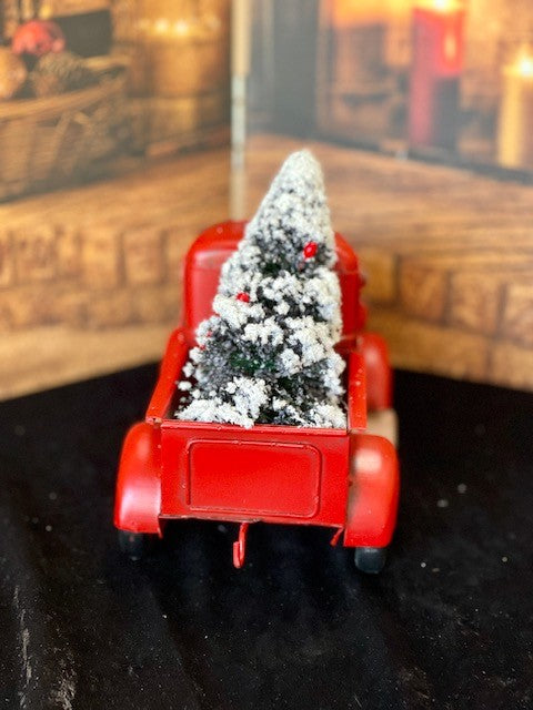 RED OLD STYLE PICK UP TRUCK WITH TREE