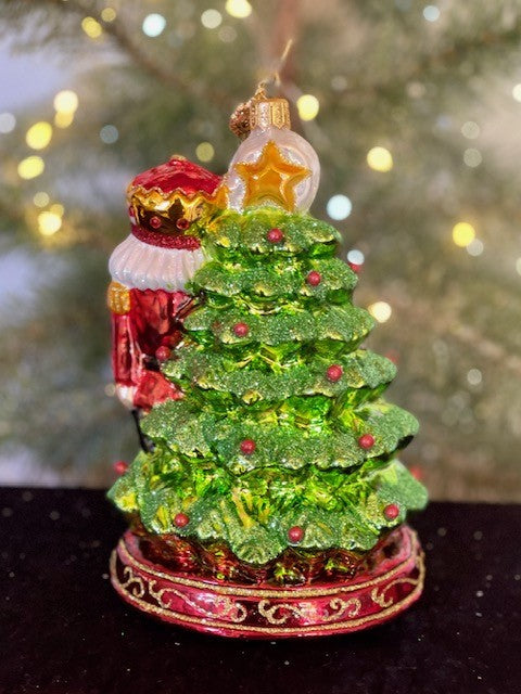 HURAS FAMILY GLASS ORNAMENTS - NUTCRACKER BY THE CHRISTMAS TREE S344