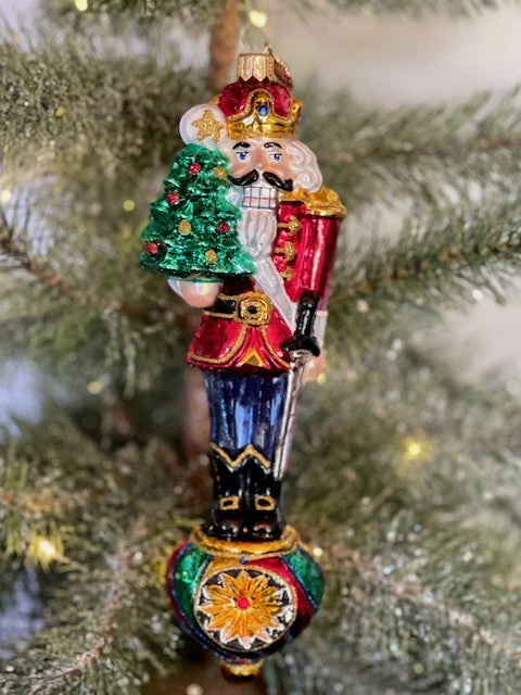 HURAS FAMILY GLASS ORNAMENTS - NUTCRACKER ON A REFLECTOR S396