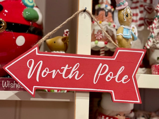RED NORTH POLE ARROW HANGING SIGN X2525