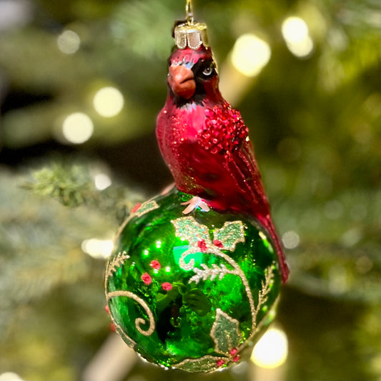 ERIC CORTINA CARDINAL ON GREEN GLASS BALL GLASS HANGING ORNAMENT 4353115