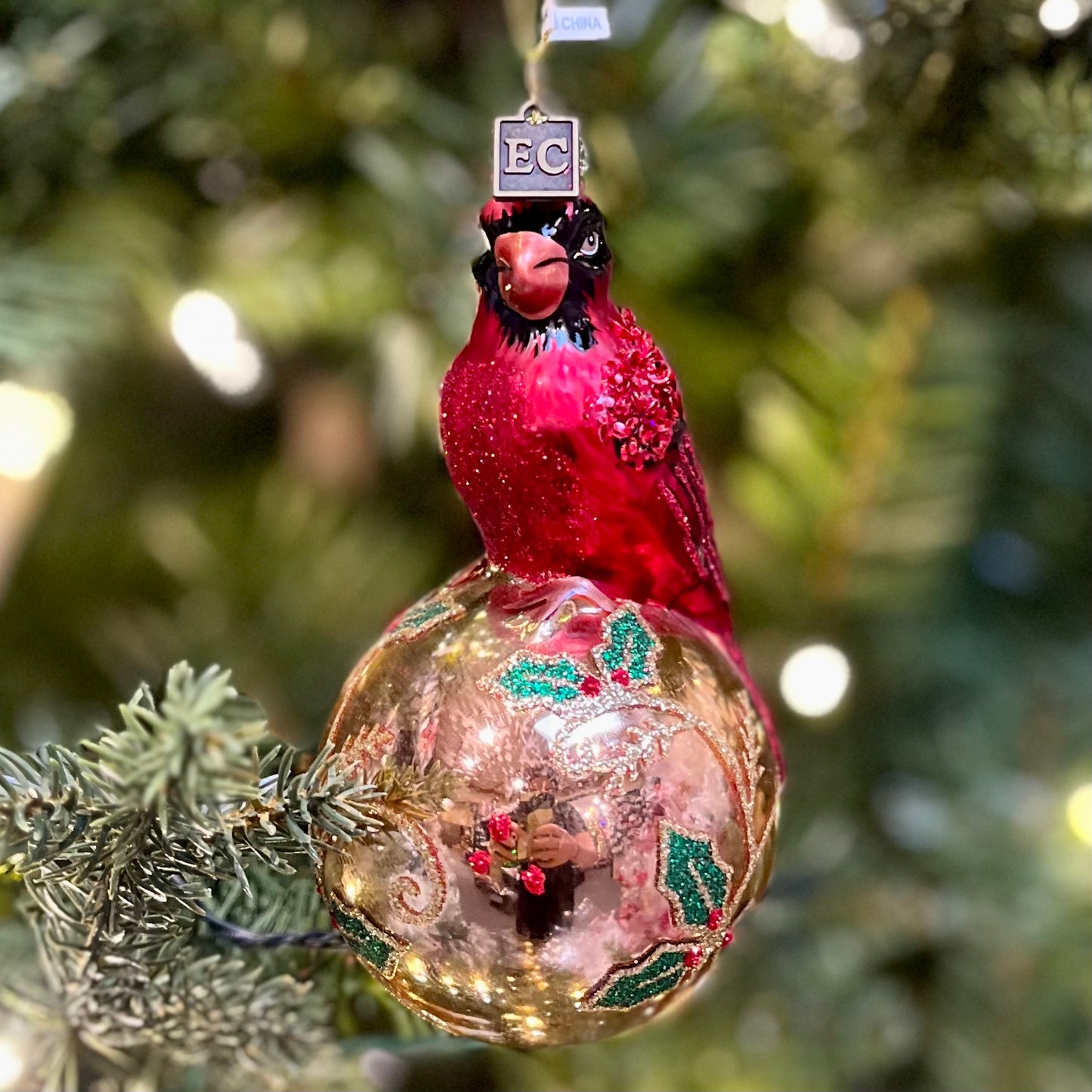 ERIC CORTINA CARDINAL ON GOLD BALL 5 INCH GLASS HANGING ORNAMENT 4353115