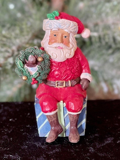 JIM SHORE HWC SANTA ON GIFT 6011487