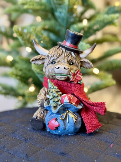 SITTING HIGHLAND COW WITH TOP HAT XM836S
