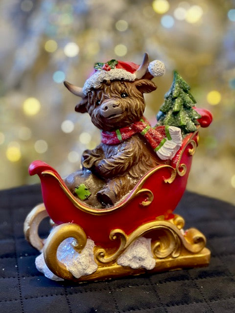 HIGHLAND COW IN SLEIGH WITH TREE 26771