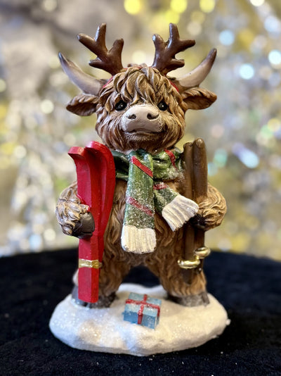 STANDING HIGHLAND COW WITH SKIS 26773