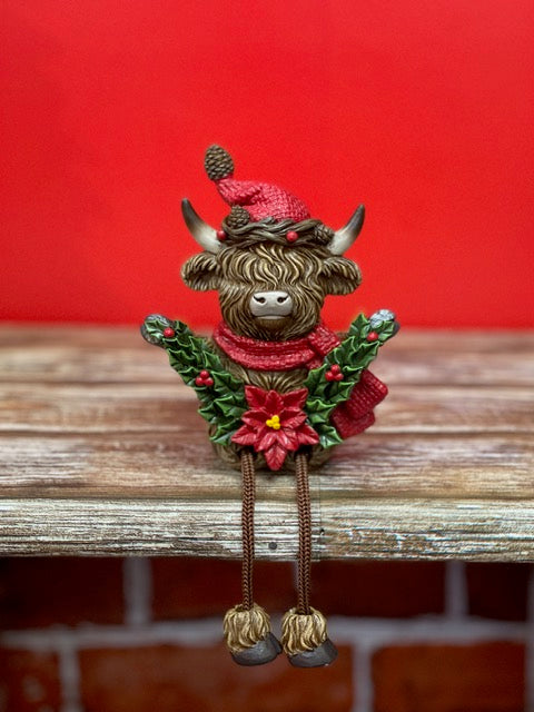 CHRISTMAS HIGHLAND COW WITH GARLAND WITH DANGLY LEGS 27602