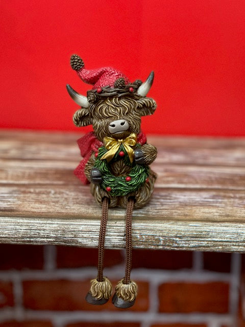 CHRISTMAS HIGHLAND COW WITH WREATH WITH DANGLY LEGS 27602