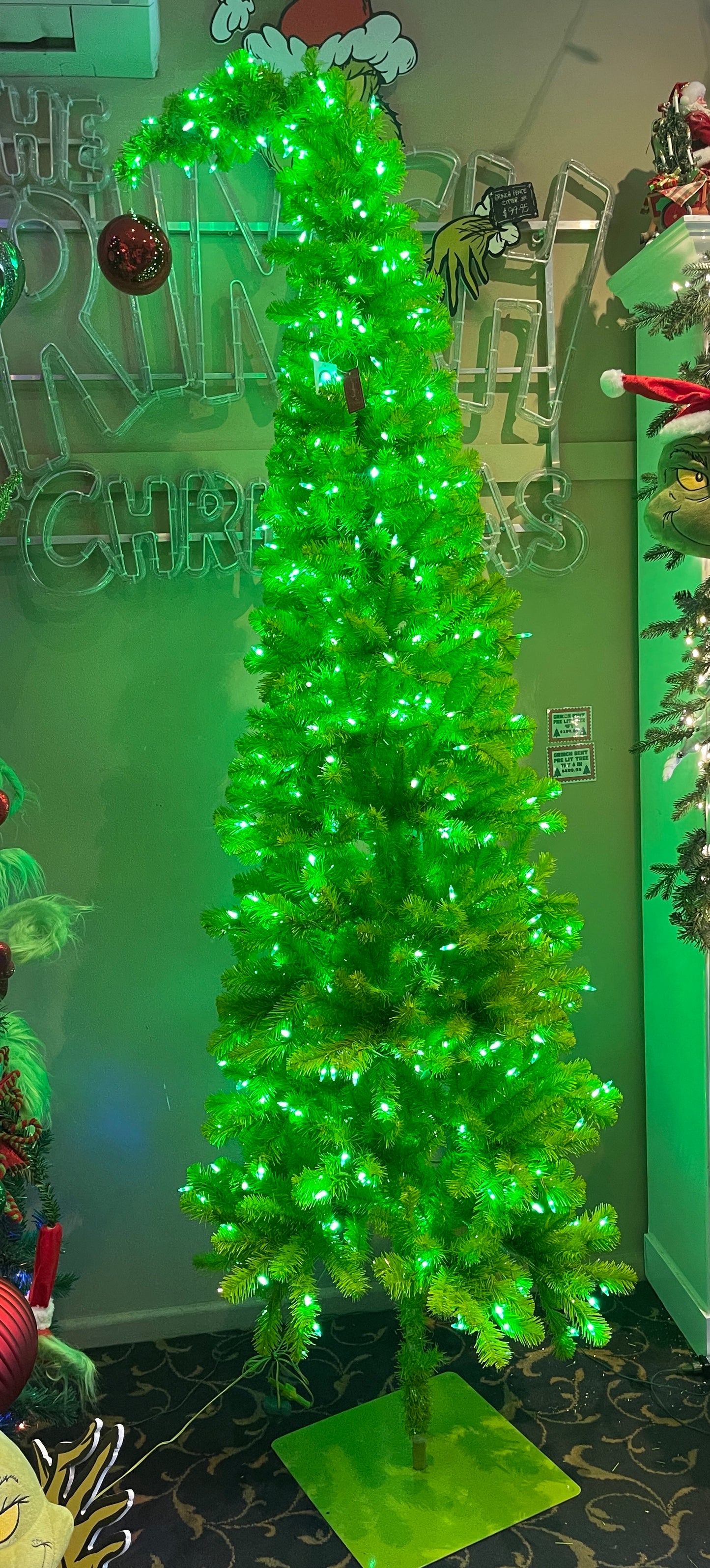 GRINCH GREEN PRE LIT 7.5FT BENT OVER TREE HZG77 (PICK UP IN STORE ONLY)