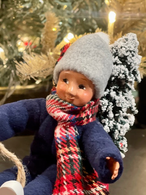 BYERS' CHOICE - TODDLER BOY ON SLED 1832