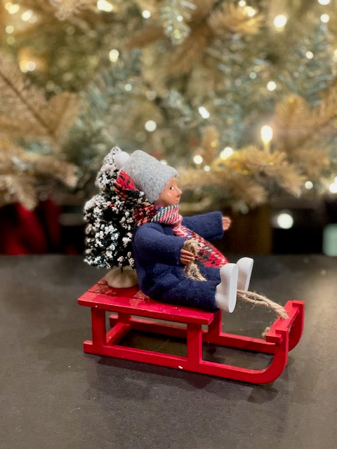 BYERS' CHOICE - TODDLER BOY ON SLED 1832