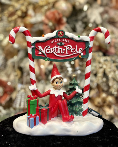 RED ELF ON NORTH POLE SIGN 21345