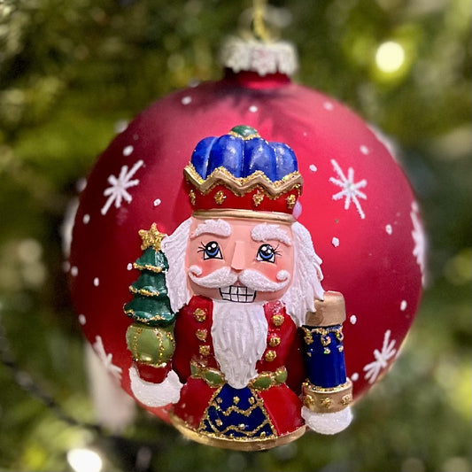HANDPAINTED NUTCRACKER ON RED 12CM GLASS BALL ORNAMENT X2817