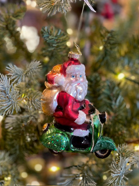 SANTA ON A VESTA HANGING ORNAMENT EXM065