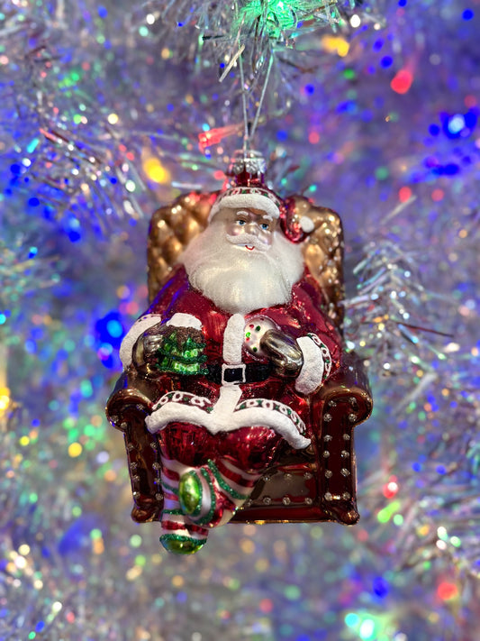 SANTA ON A SOFA GLASS ORNAMENT FCA172