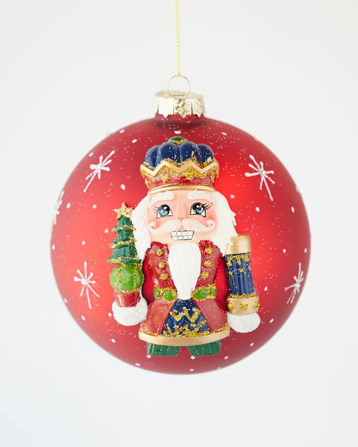HANDPAINTED NUTCRACKER ON RED 12CM GLASS BALL ORNAMENT X2817